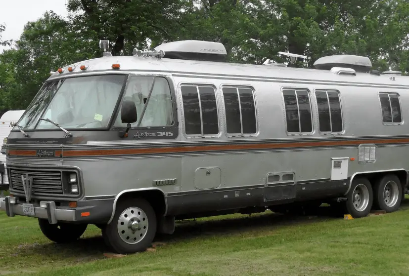 A parked rv using leveling blocks