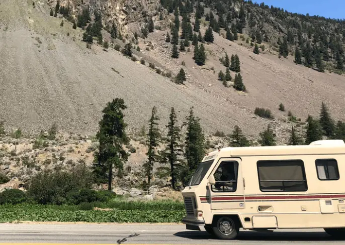 an rv being driven on the road
