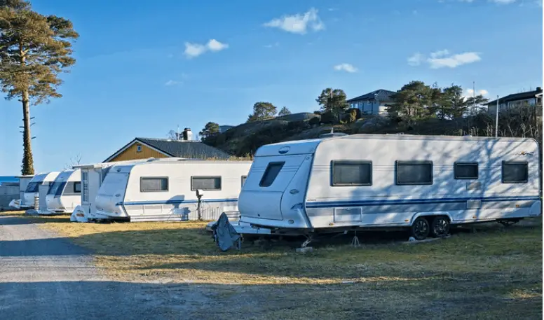 number of travel trailers parked on road side