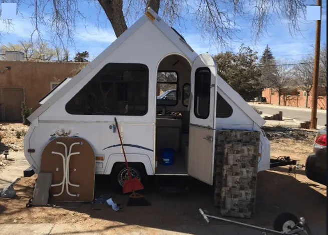 camping in a hard sided a-frame camper